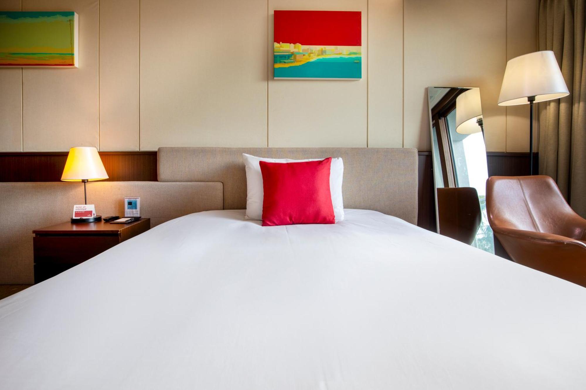 Готель Ramada By Wyndham Jeju Hamdeok Екстер'єр фото